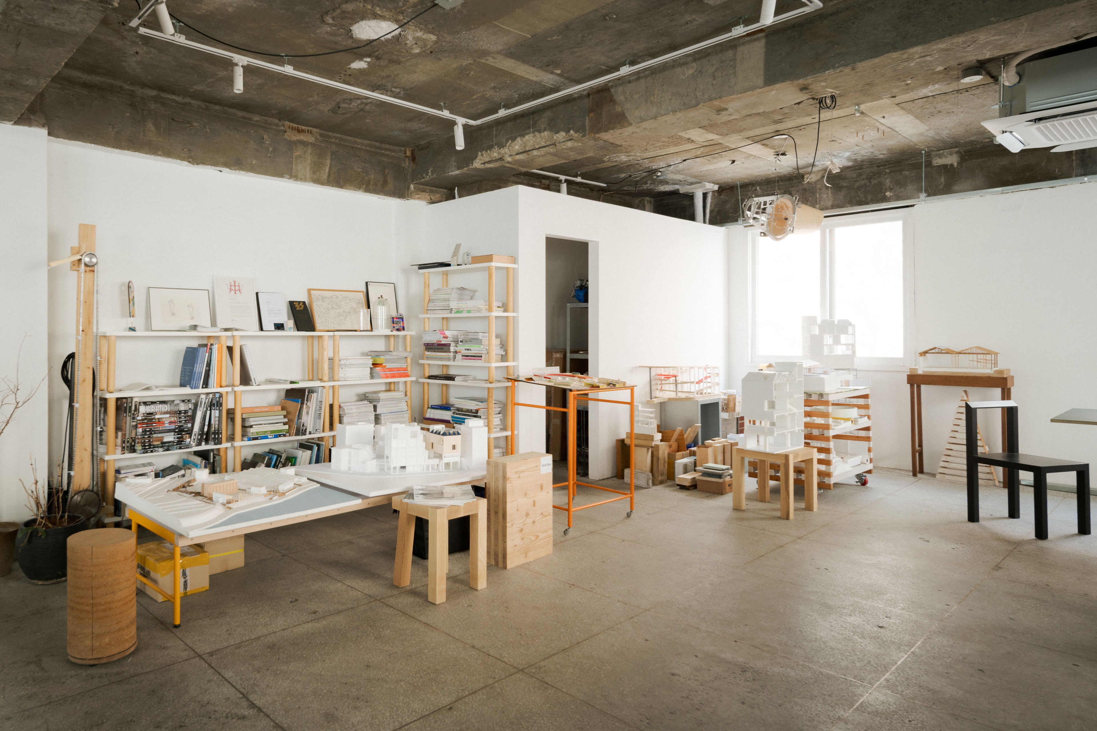 Light and negative space shape the studio's texture — a record of the moments that linger within it.